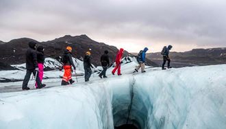 group glacier hiking on solheimajokull glacier