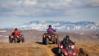 riding atvs through mountain roads in iceland
