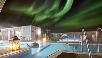 aurora borealis above laugarvatn geothermal spa