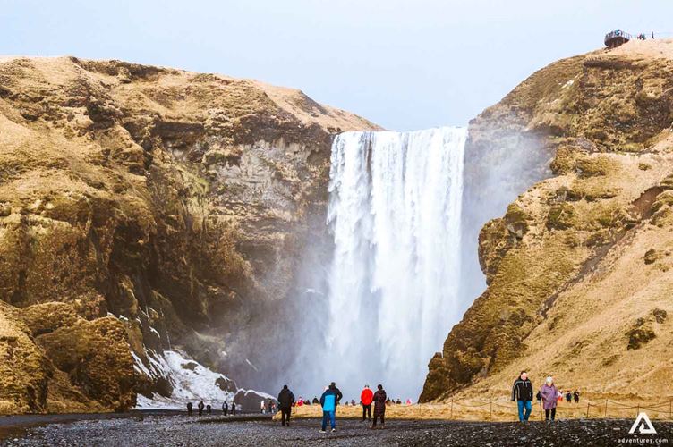 Watching Skogafoss Waterfall