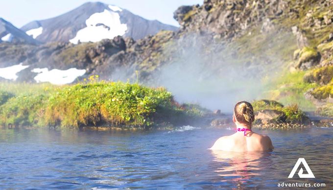 woman bathing in landmannalaugar in iceland