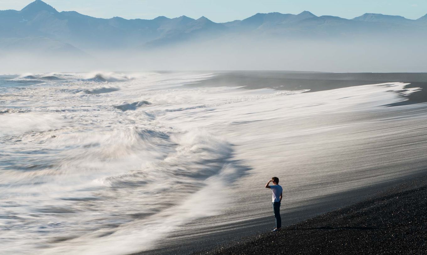 Waves Sneak Up Reynisfjara Beach in Iceland and Knock Over Tourists