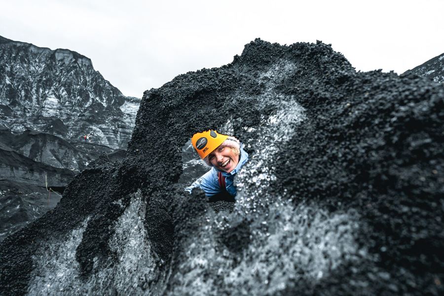 Tourist Posing Ice Formation