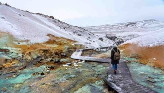 walking a wooden path in krysuvik seltun area