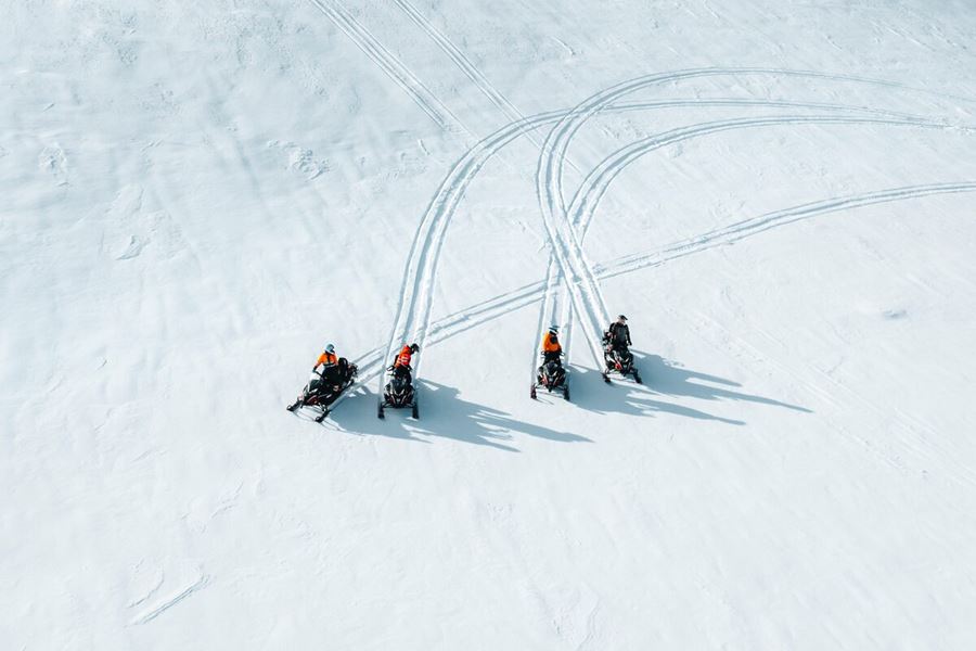 Four Snowmobiles Stopped On The langjokull Glacier