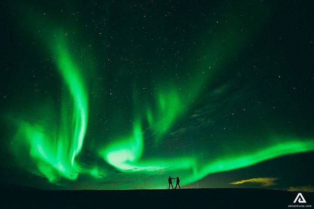 Couple watching Northern Lights
