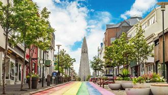 rainbow painted street near hallgrimskirkja church in iceland