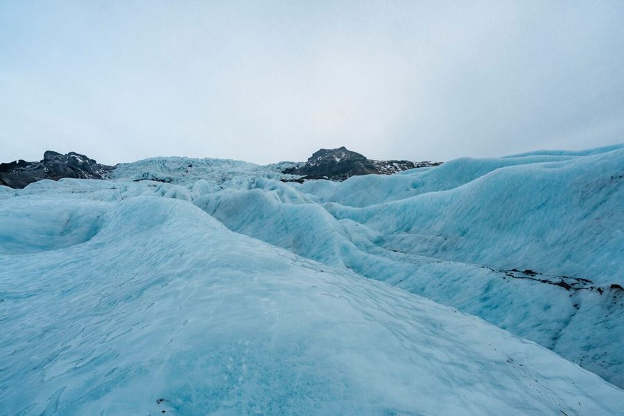 Blue ice crevasses on glacier in Iceland