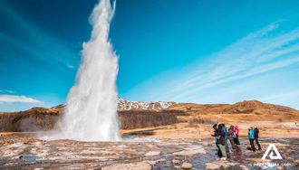 people watching geysir strokkur eruption