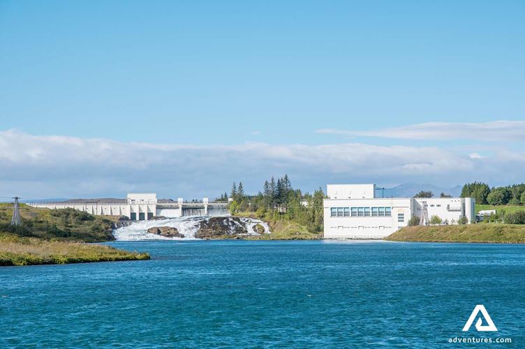geothermal power plant near ljosafoss waterfall