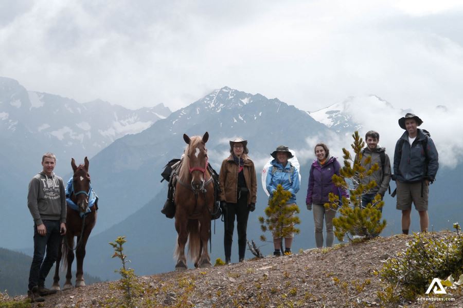 Tourists on a horseback riding tour