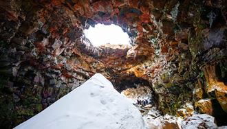 Lava Tunnels Opening In Winter With Snow Hill