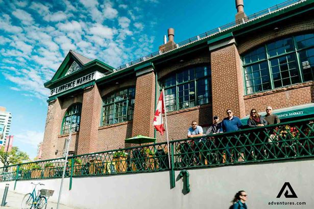 people posing near a building in toronto