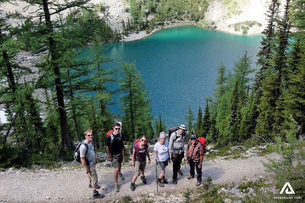 Group by Blue Lake in Rocky Mountains