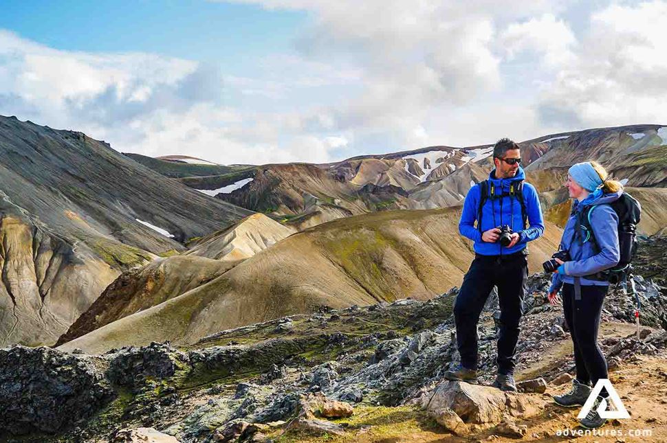 two hikers talking in landmannalaugar at summer