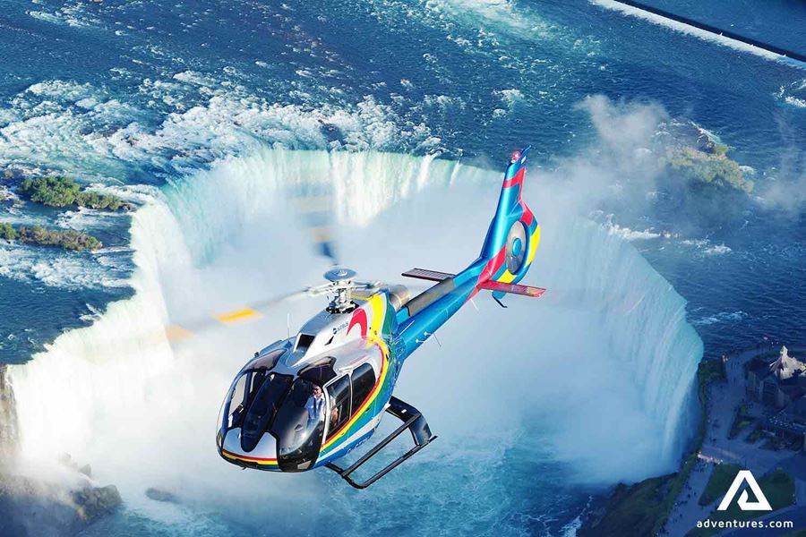 helicopter flying over niagara falls