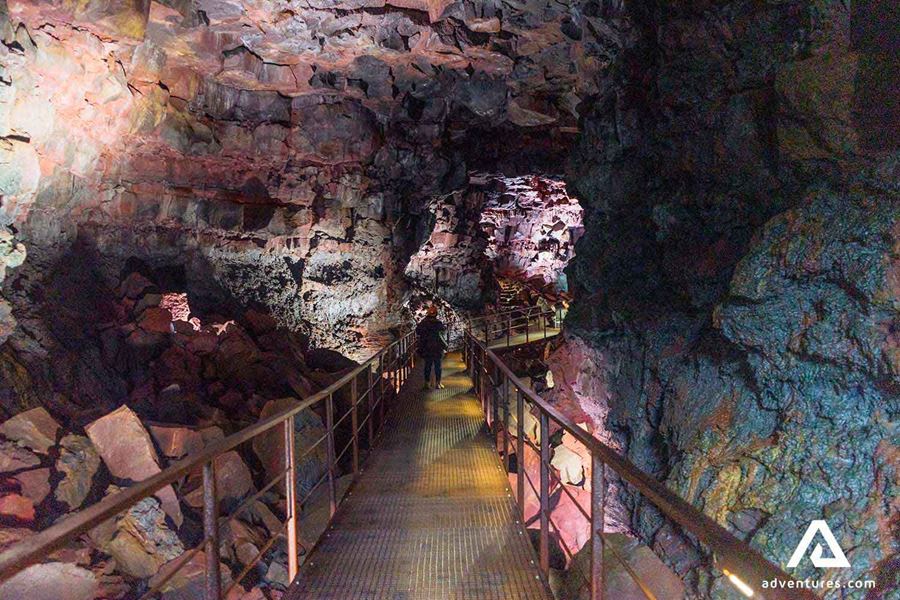 steel walking path inside a lava cave