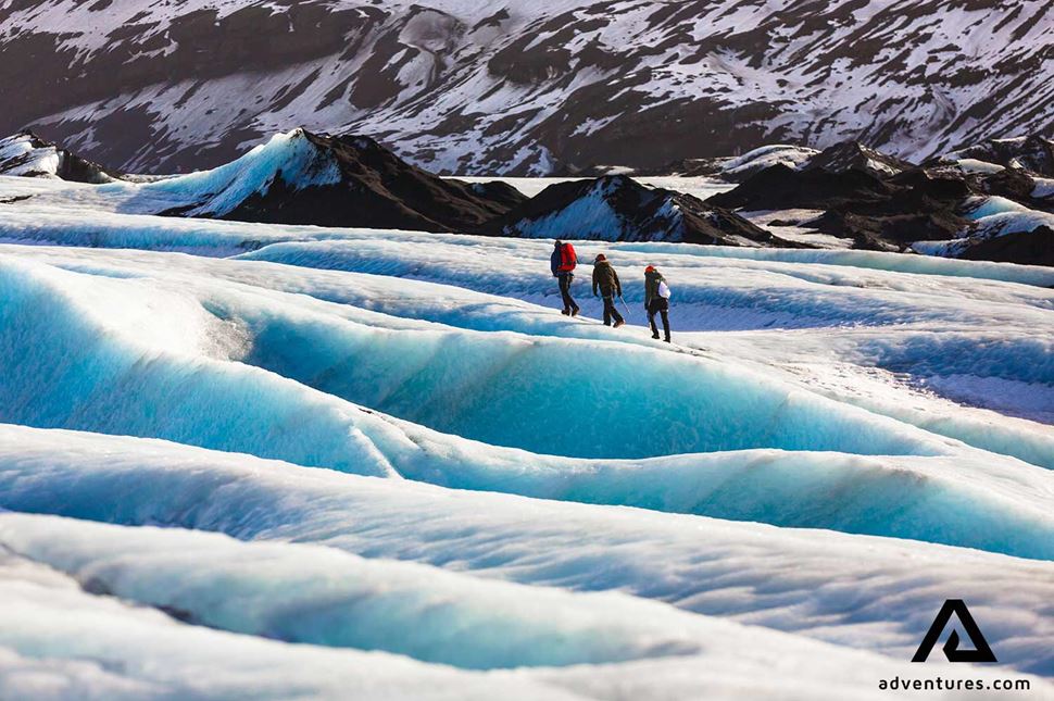 walking with a guide on solheimajokull glacier