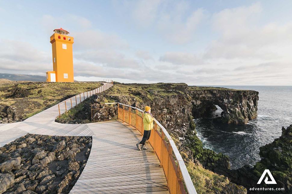 orange lighthouse in snaefellsnes in iceland