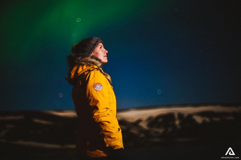 Woman watching Northern Lights