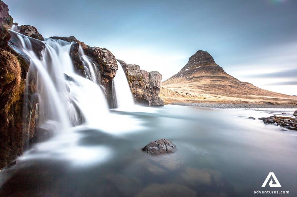 kirkjufellsfoss waterfall near kirkjufell mountain in winter
