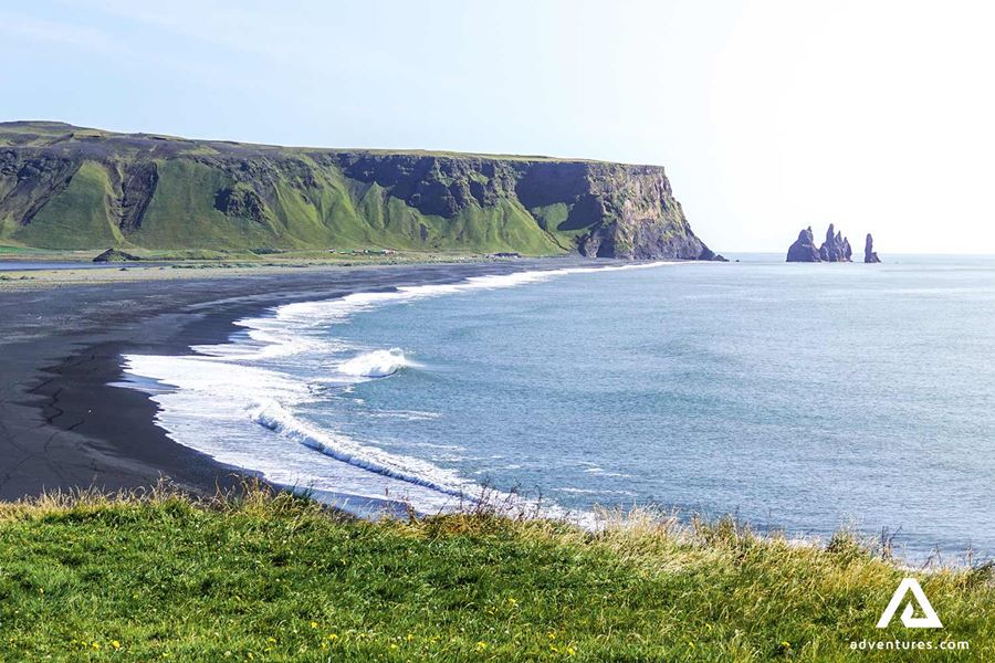 sunny summer view of dyrholaey